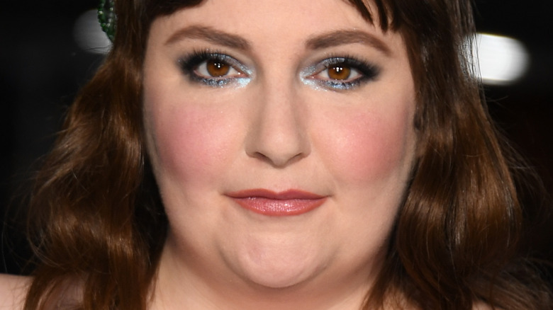 Lena Dunham poses