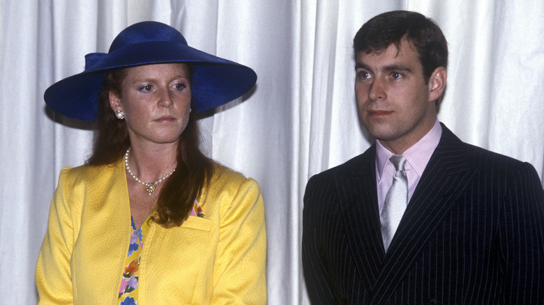 Sarah Ferguson sad, Prince Andrew staring