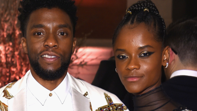 Chadwick Boseman and Letitia Wright smiling