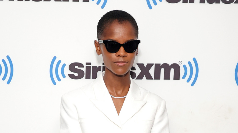 Letitia Wright in sunglasses on the red carpet