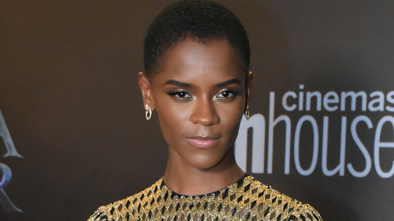 Letitia Wright posing on the red carpet