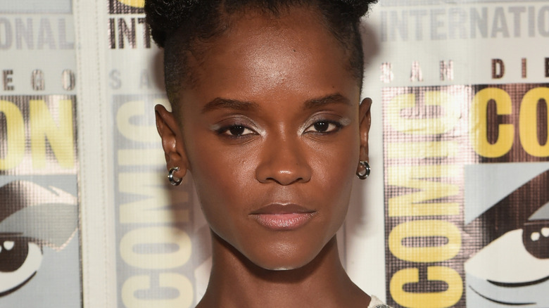Letitia Wright looking pensive on the red carpet