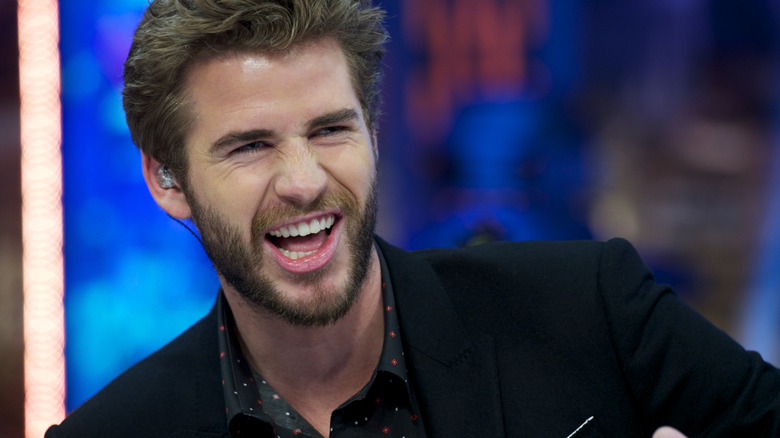 Liam Hemsworth laughing