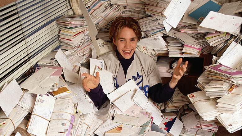 Jonathan Brandis with fan mail