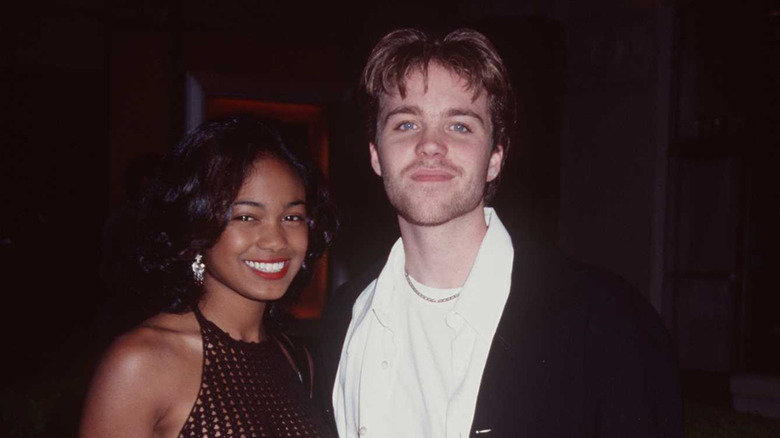 Jonathan Brandis and Tatyana Ali smiling