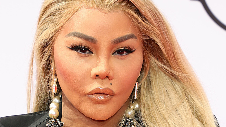 Lil' Kim gazing in front