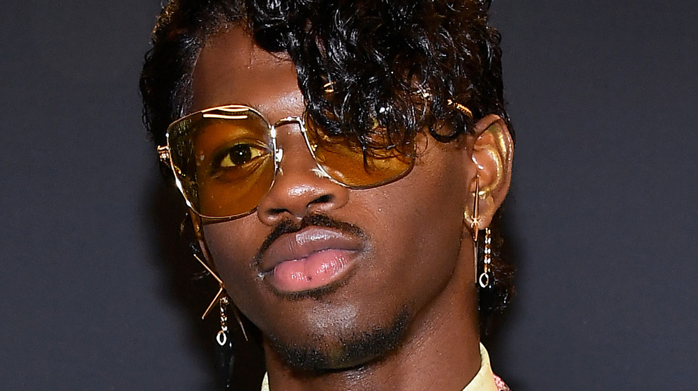 Lil Nas X posing with sunglasses