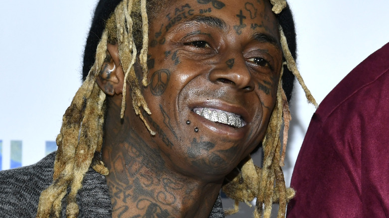 Lil Wayne diamond grilz blonde dreadlocks