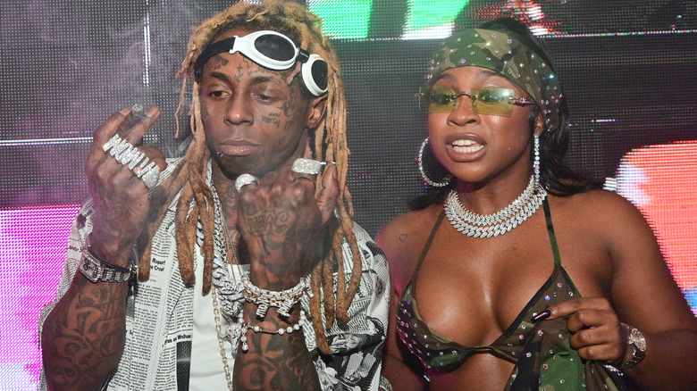 Lil Wayne diamond nuckle dusters Reginae Carter bikini top