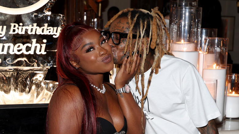 Lil Wayne kissing daughter Reginae Carter