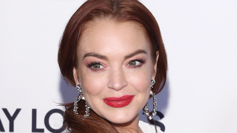 Lindsay Lohan posing for cameras