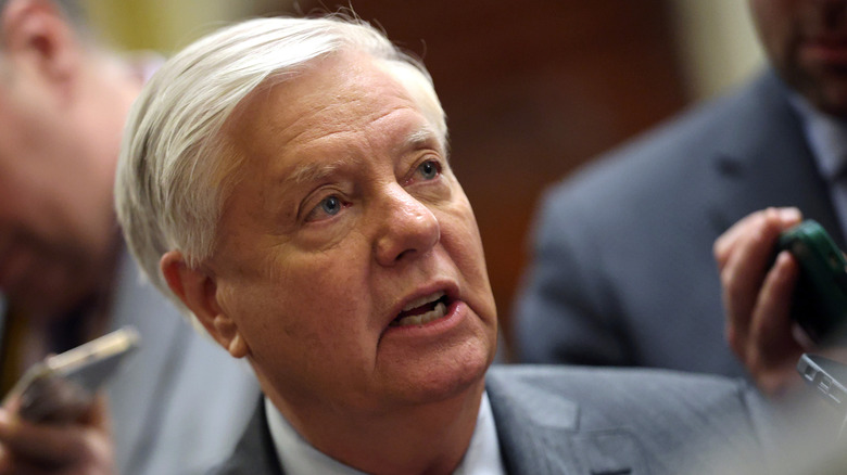 Lindsey Graham looking up.