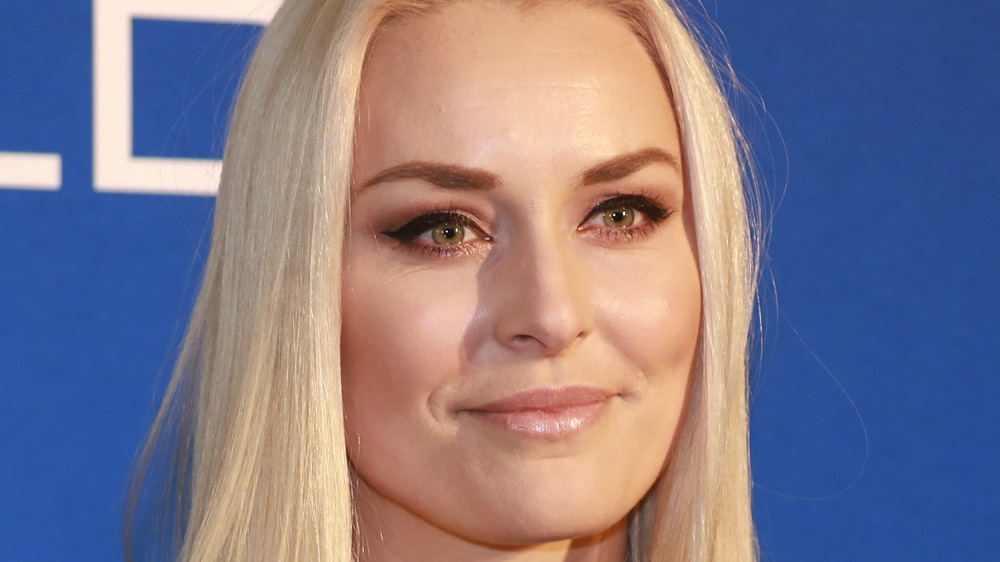 Lindsey Vonn gives a slight smile on the red carpet