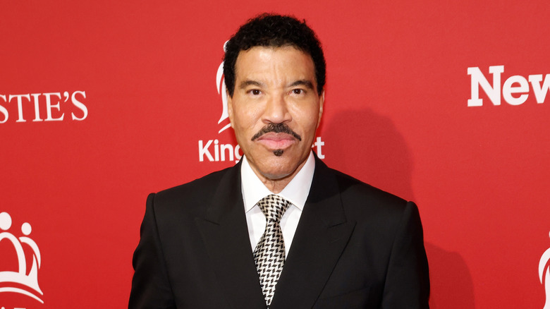 Close-up photo of Lionel Richie on the red carpet.