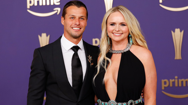 Brendan McLoughlin and Miranda Lambert wearing black