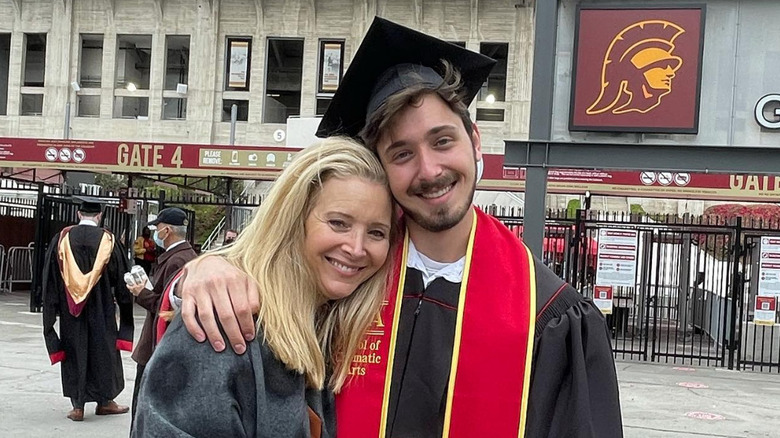 Lisa Kudrow and Julian Murray Stern pose at Stern's graduation ceremony