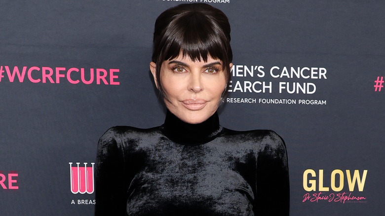 Lisa Rinna bangs black turtleneck dress