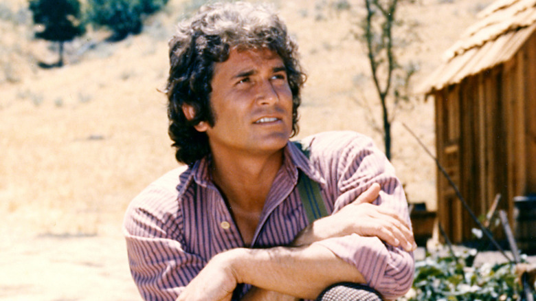 Michael Landon posing on set of Little House On The Prairie