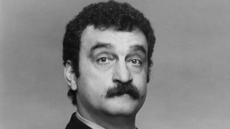 Victor French posing for cameras in 1977
