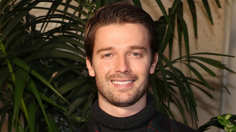 Patrick Schwarzenegger smiling