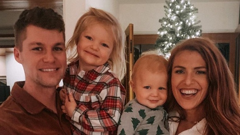 Jeremy and Audrey Roloff holding Ember and Bode