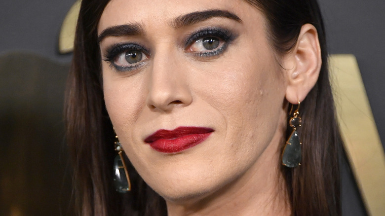 Lizzy Caplan red lipstick blue eyeshadow