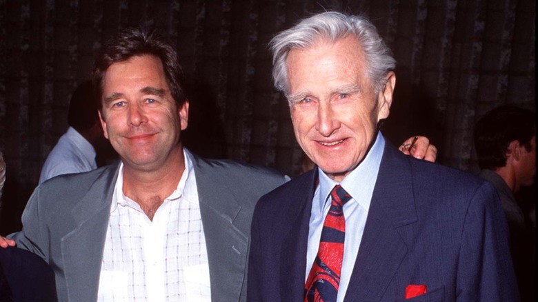 Beau and Lloyd Bridges posing together at an event in suits