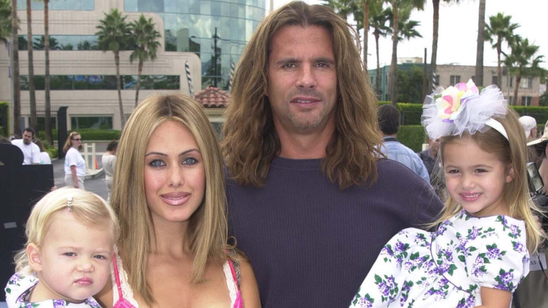 Shauna Sand and Lorenzo Lamas posing with young Alexandra Lamas and Victoria Lamas.