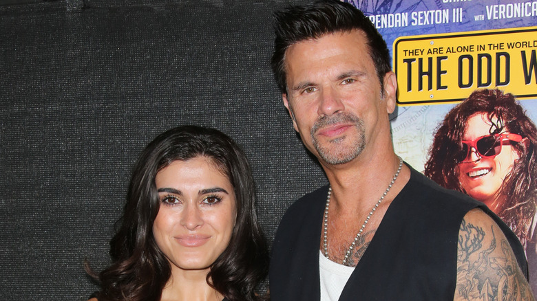 Shawna Craig posing at an event with Lorenzo Lamas.