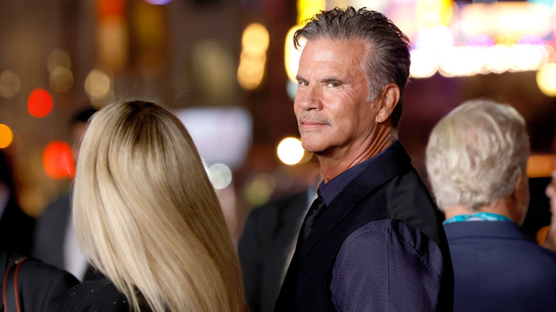 Lorenzo Lamas with a blond woman