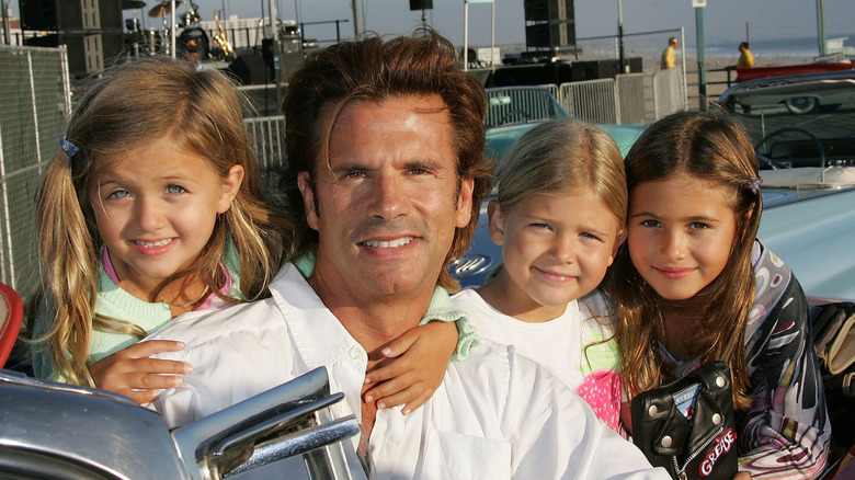 Lorenzo Lamas poses with Isabella, Victoria, and Alexandra in 2006.