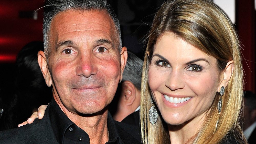 Mossimo Giannulli and Lori Loughlin smiling