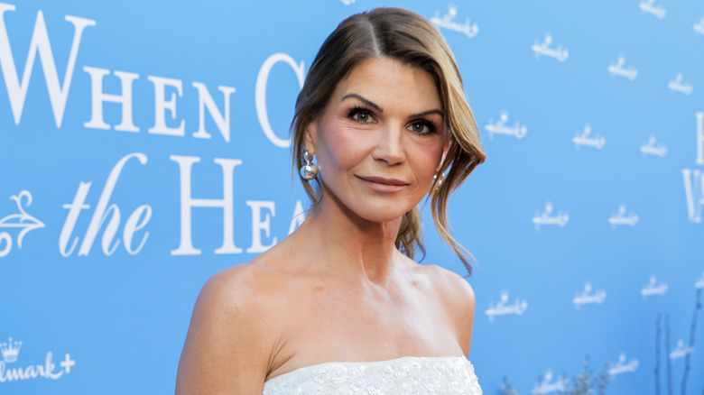 Lori Loughlin in a white dress.