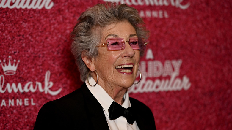 Ellen Travolta posing on the red carpet at a Hallmark Holiday Spectacular event.
