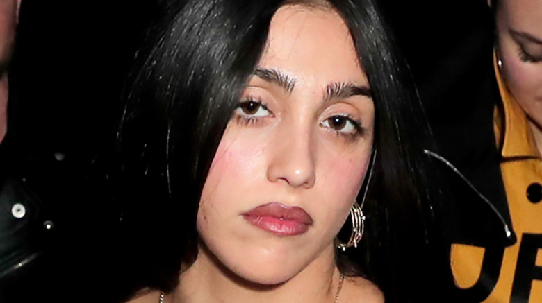 Lourdes Leon poses in front of the camera during fashion week