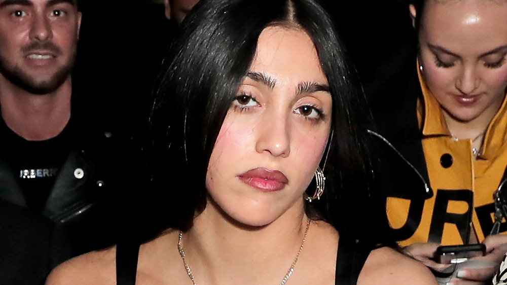 Lourdes Leon poses in front of the camera during fashion week