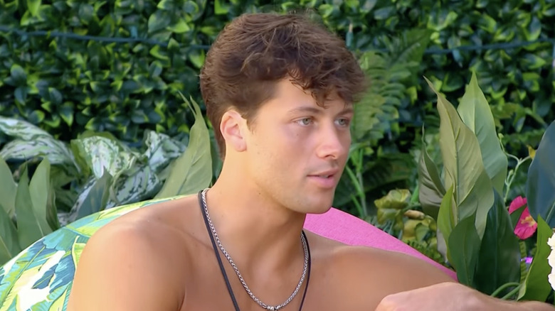 Rob Rausch by the pool during Love Island USA
