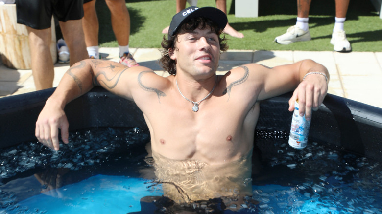 Rob Rausch relaxing in a jacuzzi