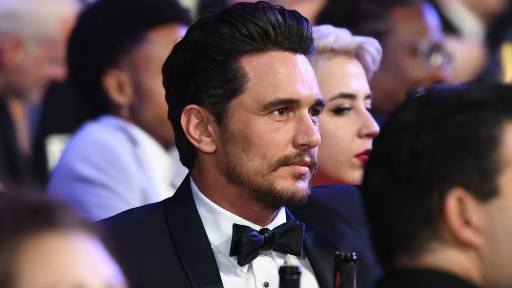 James Franco sitting at award show