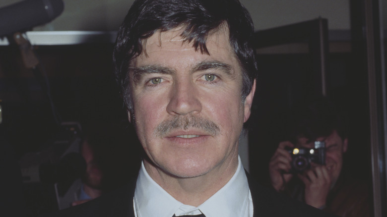 Alan Bates posing 