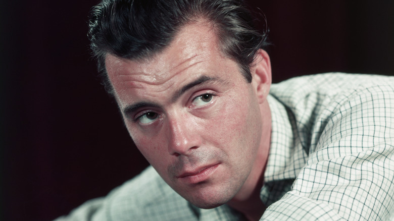 Dirk Bogarde posing 