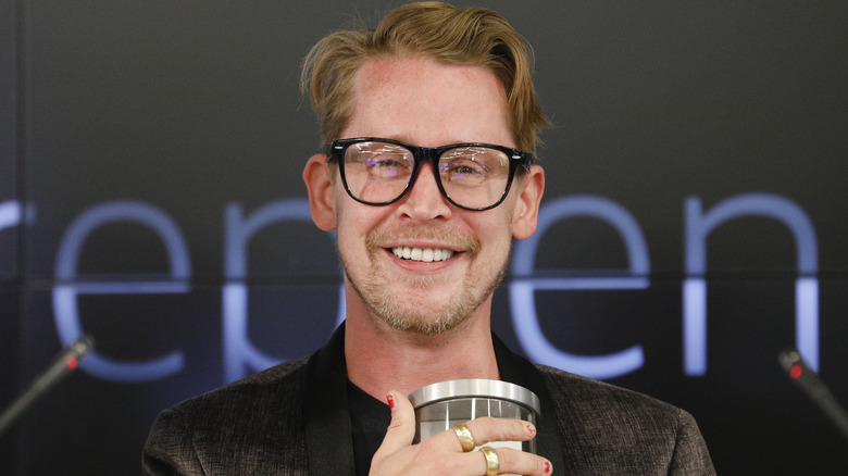Macaulay Culkin smiling