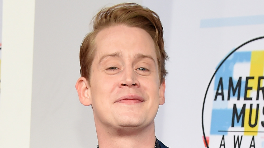 Macaulay Culkin smiling