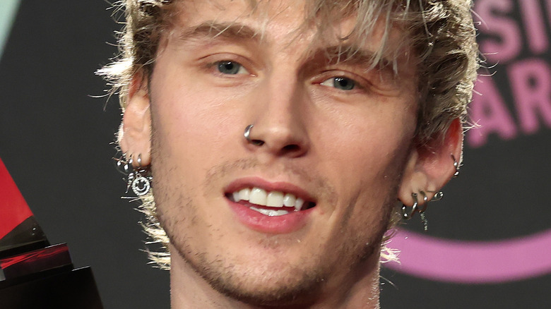 Machine Gun Kelly smiling