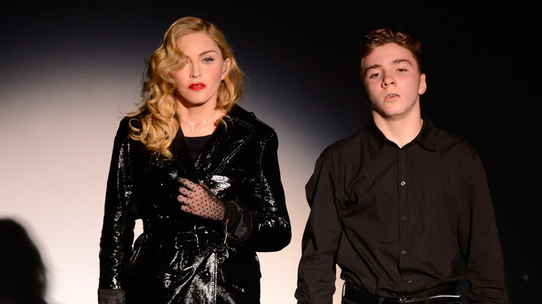 Madonna and Rocco wearing black