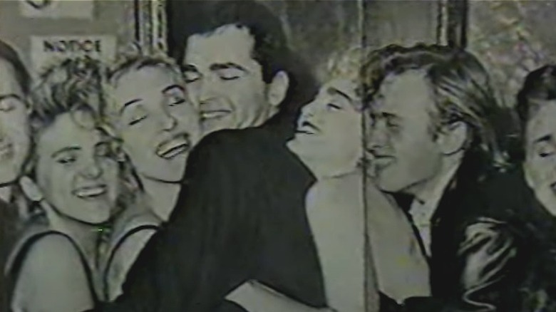 Madonna cuddling her siblings in old video
