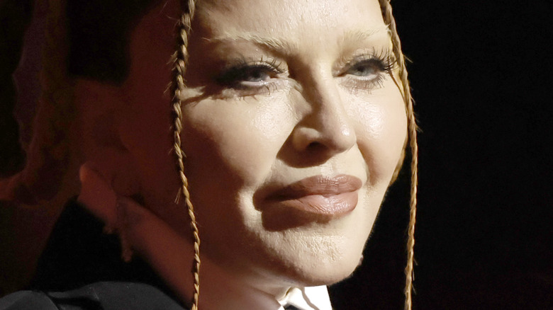 Madonna with braids and hair in buns