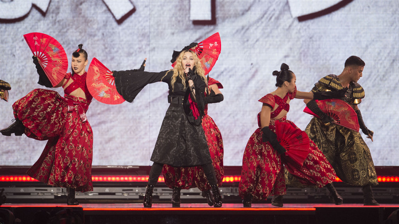 Madonna on stage with dancers