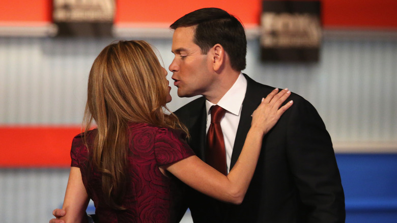 Republican Sen. Marco Rubio (R-FL) kisses his wife Jeanette after the Republican Presidential Debate.