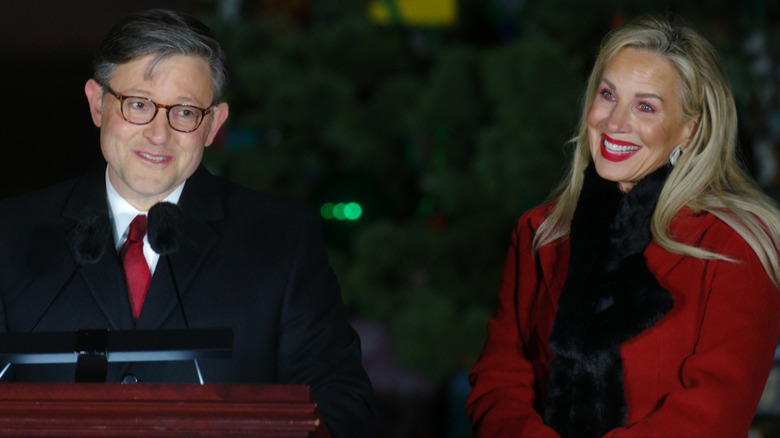 Mike Johnson (R-La.) speaks at the lighting ceremony for the Capitol Christmas Tree alongside his wife Kelly Johnson.